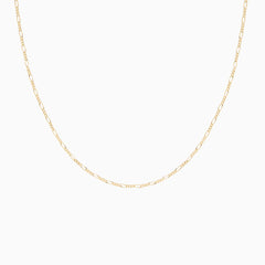 Isolated product shot of the Figaro chain necklace on a white background, showcasing its symmetrical link design.