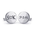 Silver cufflinks with 'SOK' and '31.5.25' engraving on a white background