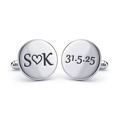 Silver cufflinks with 'SOK' and '31.5.25' engraving on a white background