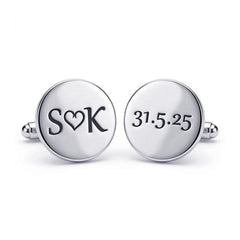 Silver cufflinks with 'SOK' and '31.5.25' engraving on a white background