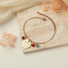 Custom Birth Flower and Birthstone Charm Bracelet Bracelet.