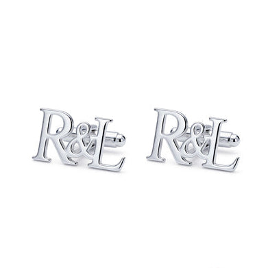 Silver 'R&L' earrings on a white background with Hallmarking logo.