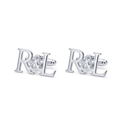 Silver 'R&L' earrings on a white background with Hallmarking logo.